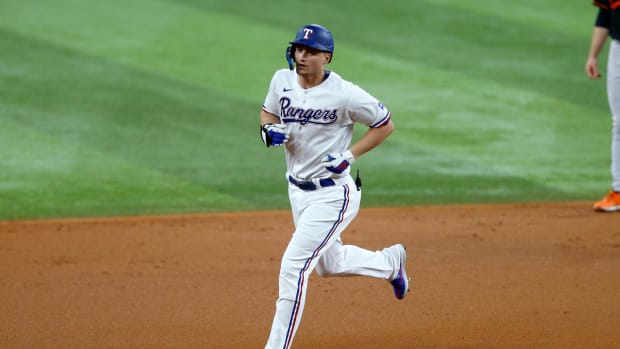 Oct 10, 2023; Arlington, Texas, USA; Texas Rangers shortstop Corey Seager (5) runs after hitting a home run against the Baltimore Orioles in the first inning during game three of the ALDS for the 2023 MLB playoffs at Globe Life Field. Mandatory Credit: Andrew Dieb-USA TODAY Sports